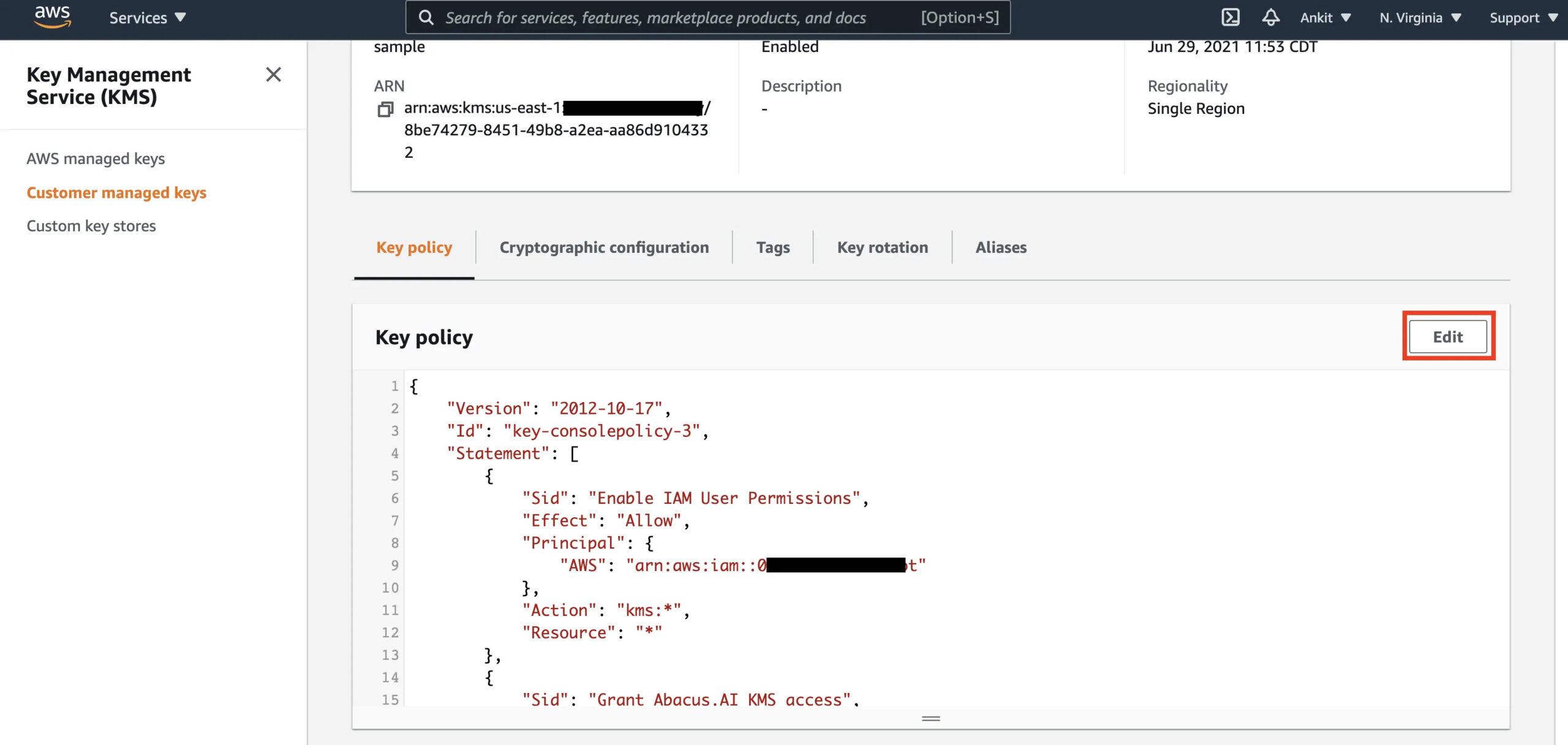 KMS console key policy editor showing the DynamoDB service principal statement added to the key policy